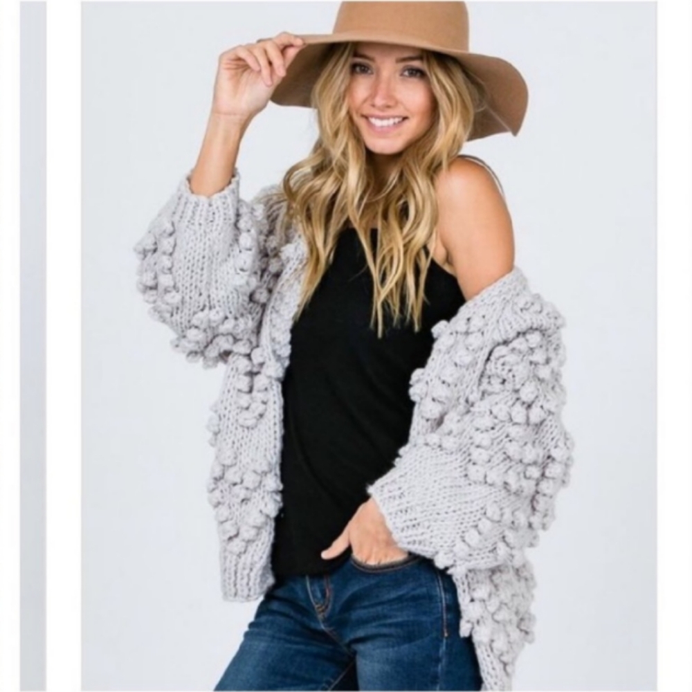 Chunky pom pom cardigan sweater